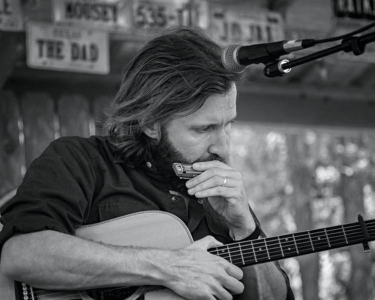 Owen Temple performing in Luckenbach Texas - Image 3